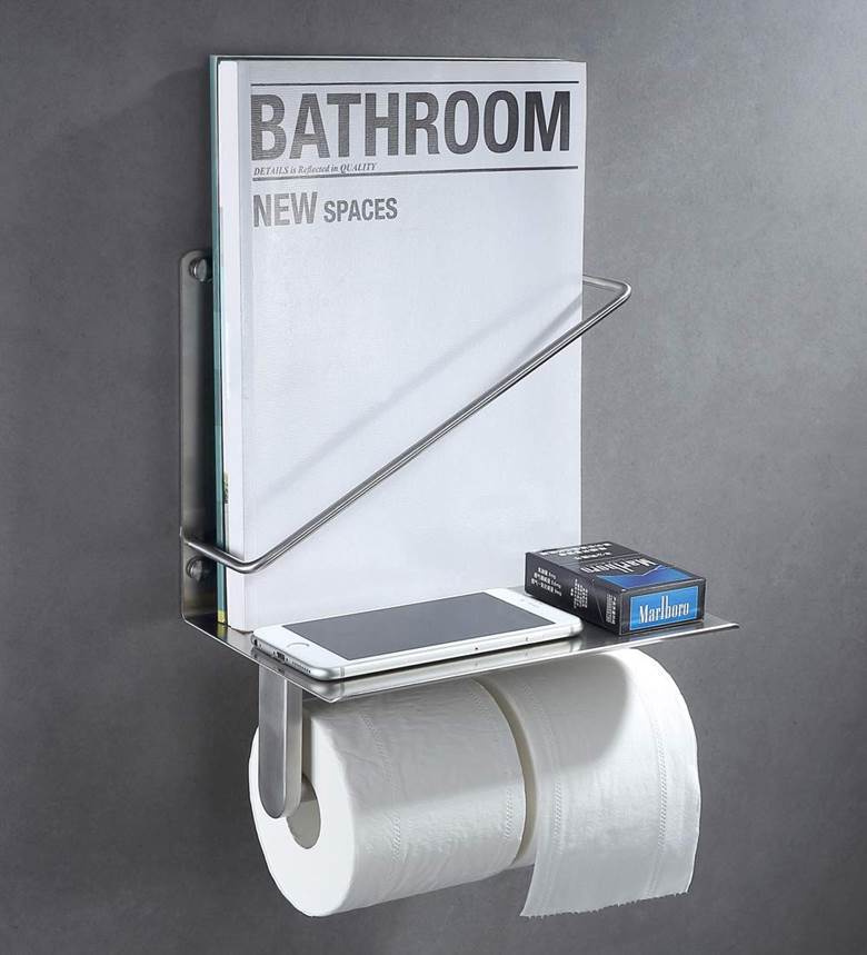 On A Wall-Mounted Magazine Rack | Toilet paper in small bathroom
